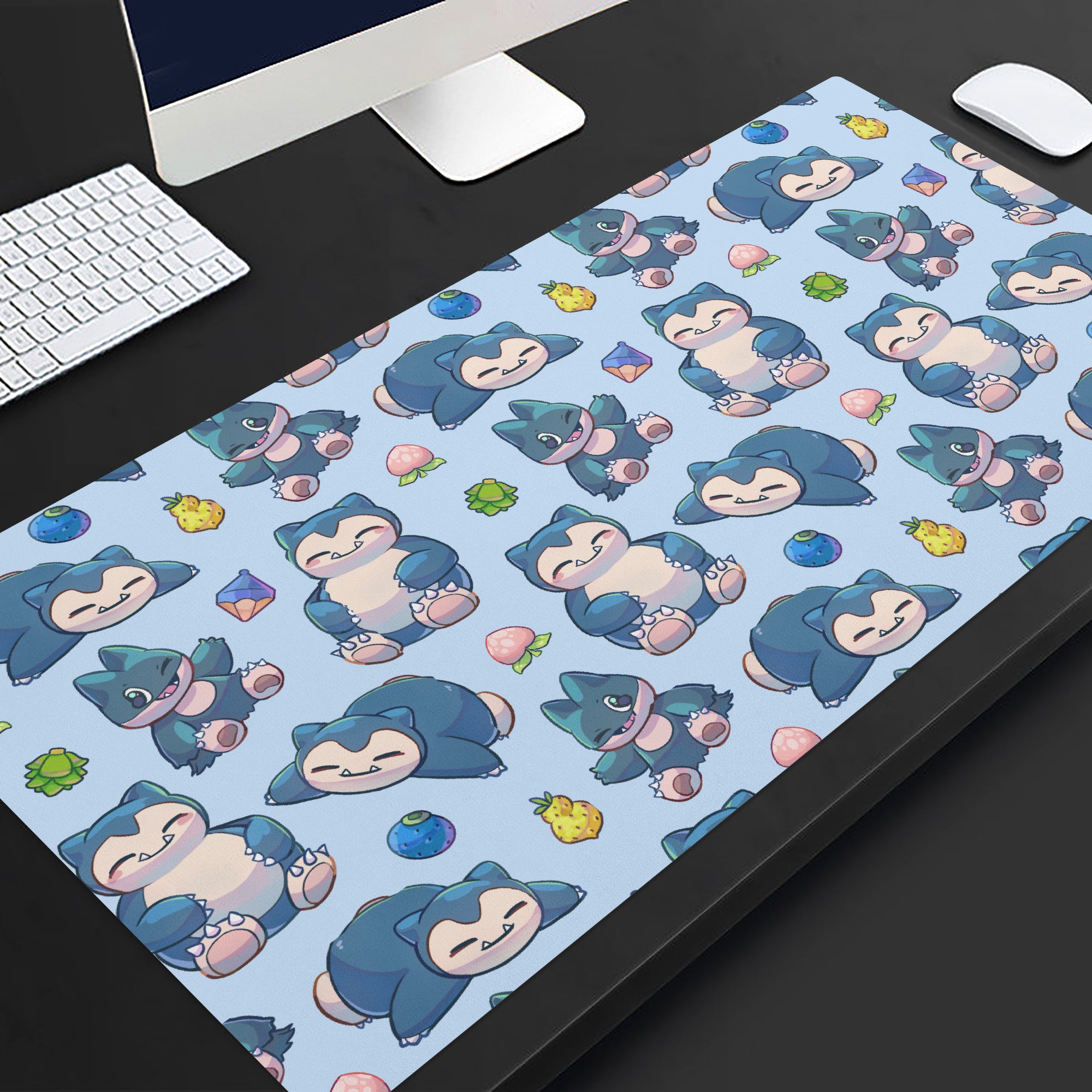 A large, light blue Snorlax and Munchlax Pokémon-themed gaming desk mat for gaming and everyday office use. 